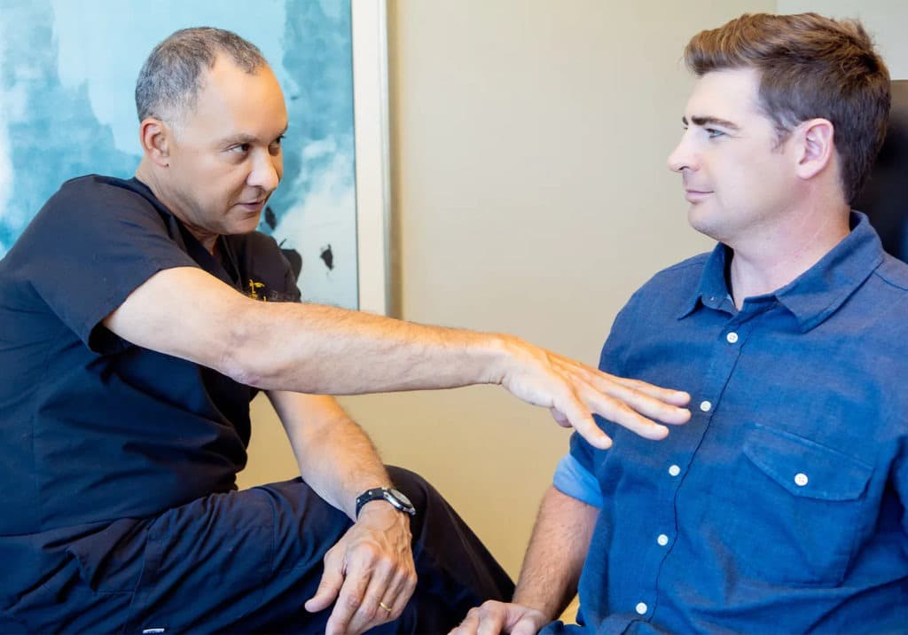 Dr Delgado with a patient